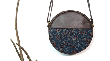 Azure Whirl Round Sling Bag