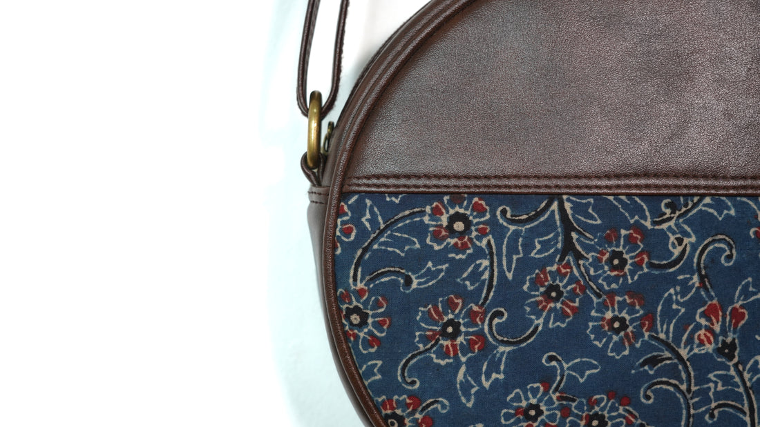 Azure Whirl Round Sling Bag
